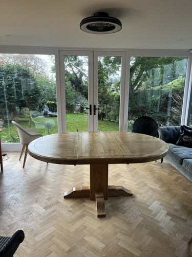 Circular solid oak dining